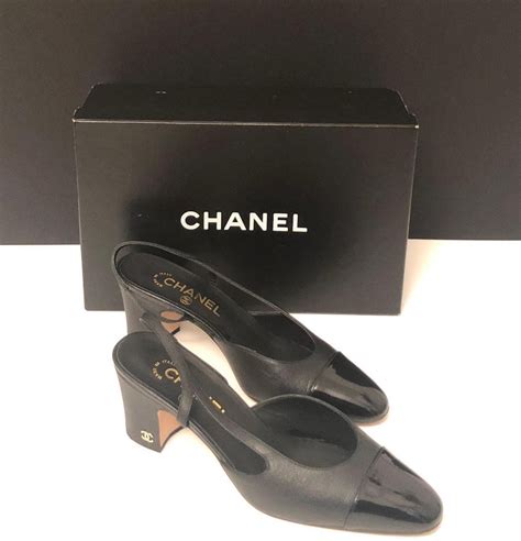 chanel nude and black shoes|all black chanel shoes.